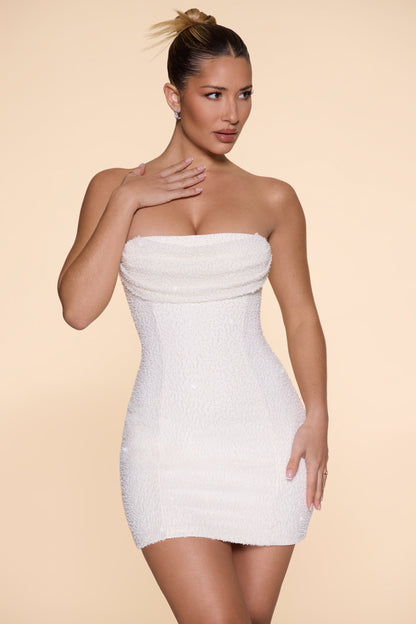 The Embellished Strapless Cowl Neck Mini Dress in Ivory