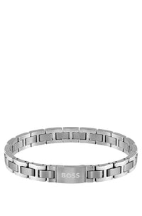 STEEL CUFF WITH MAGNETIC LOGO CLOSURE